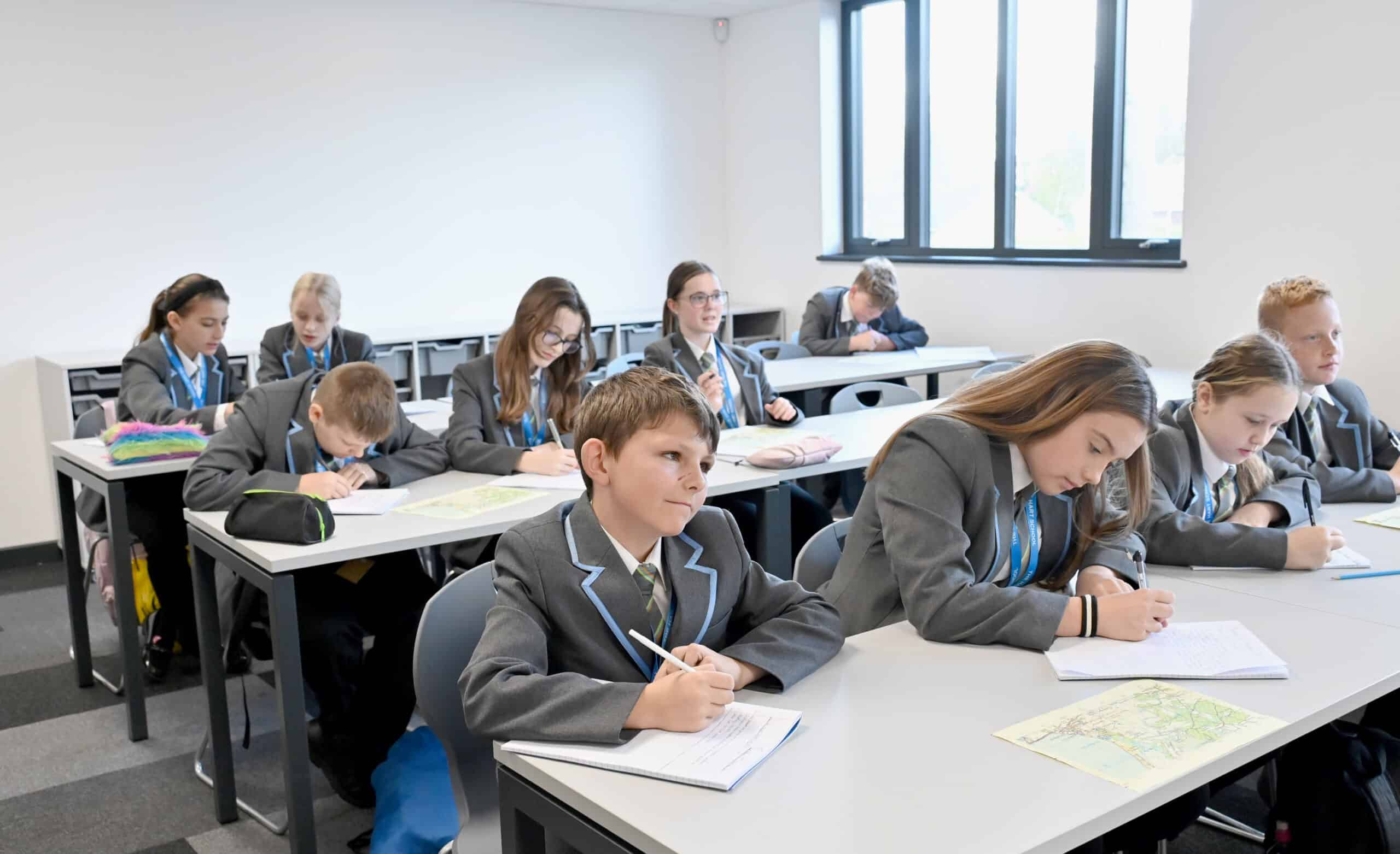 Image of school students in a net zero building